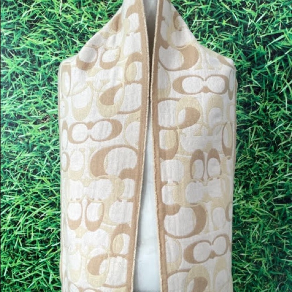 A brand new cream and tan colored Coach scarf!